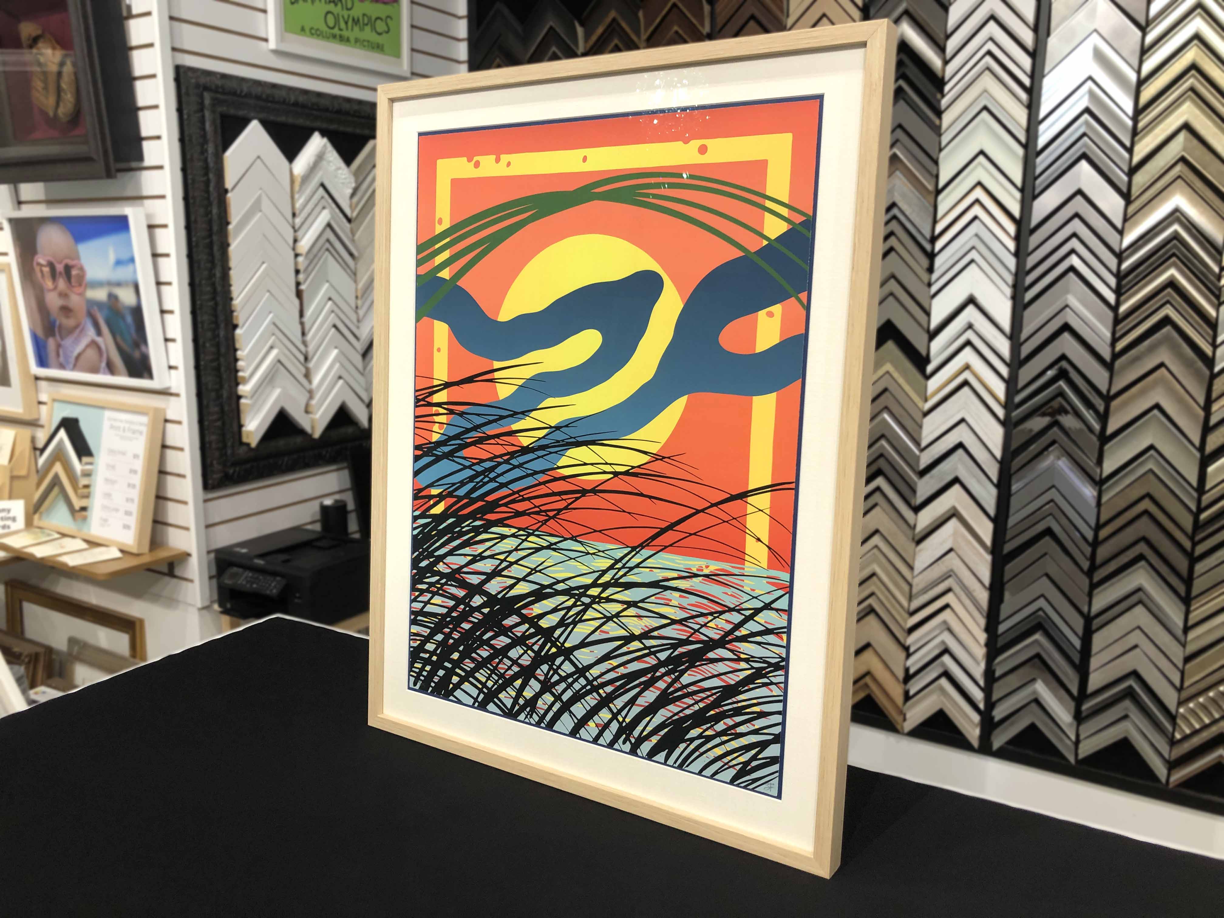 Smooth fine-art print in a contemporary frame.