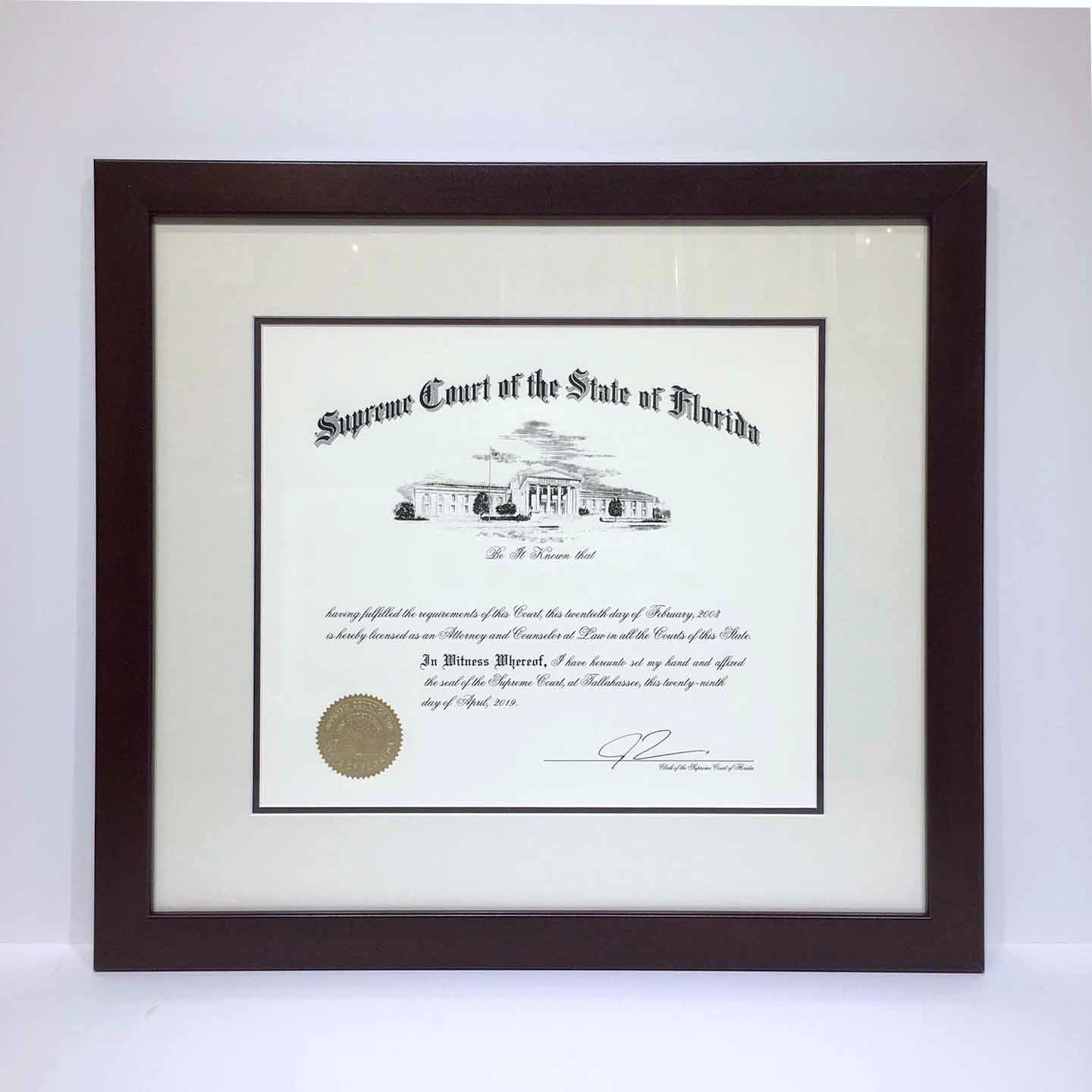 Clean credential print under glass.