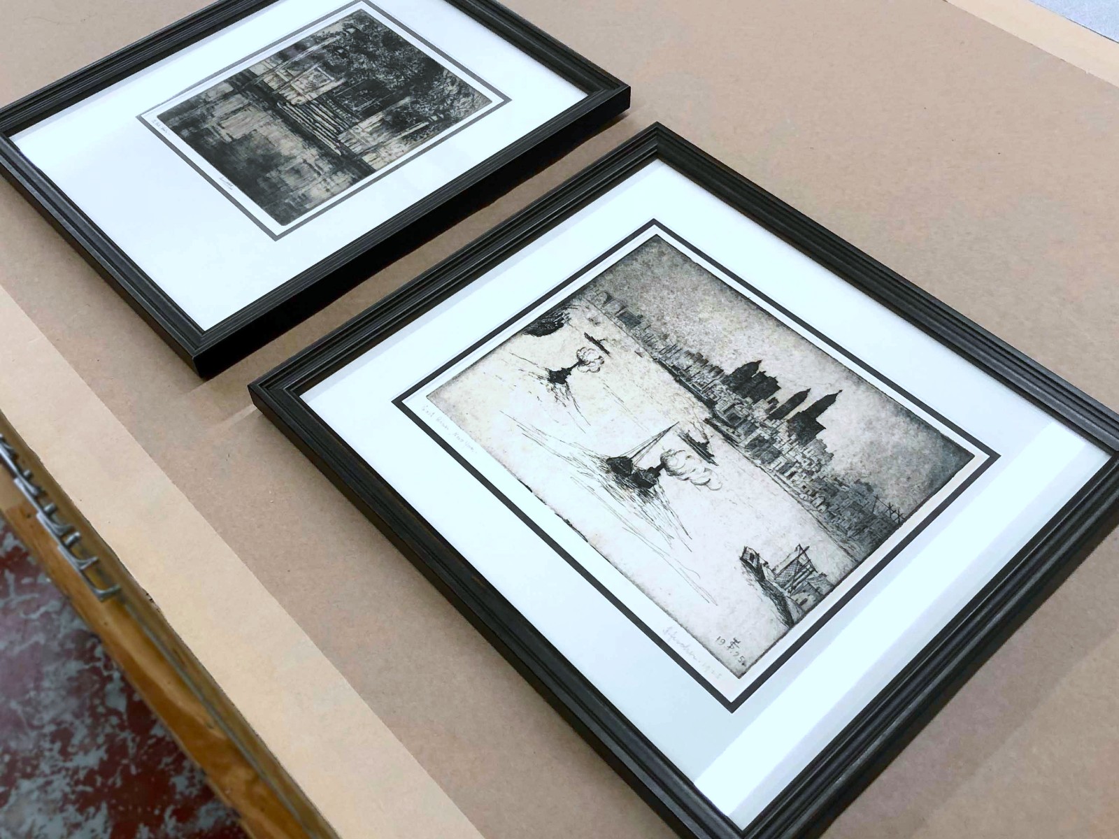 Works on paper, dark wood, archival mats