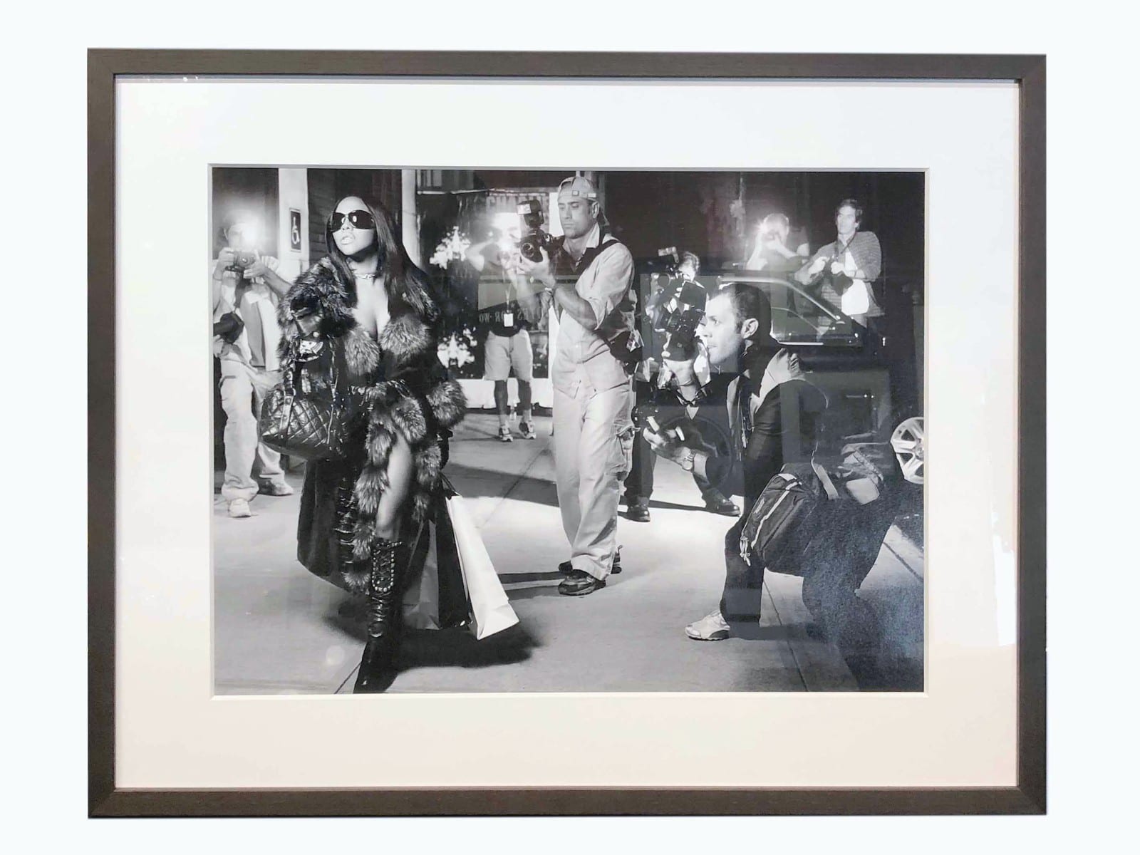 Black and white photograph, wide white mat.